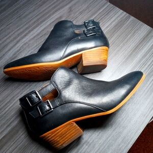 Buckled black booties